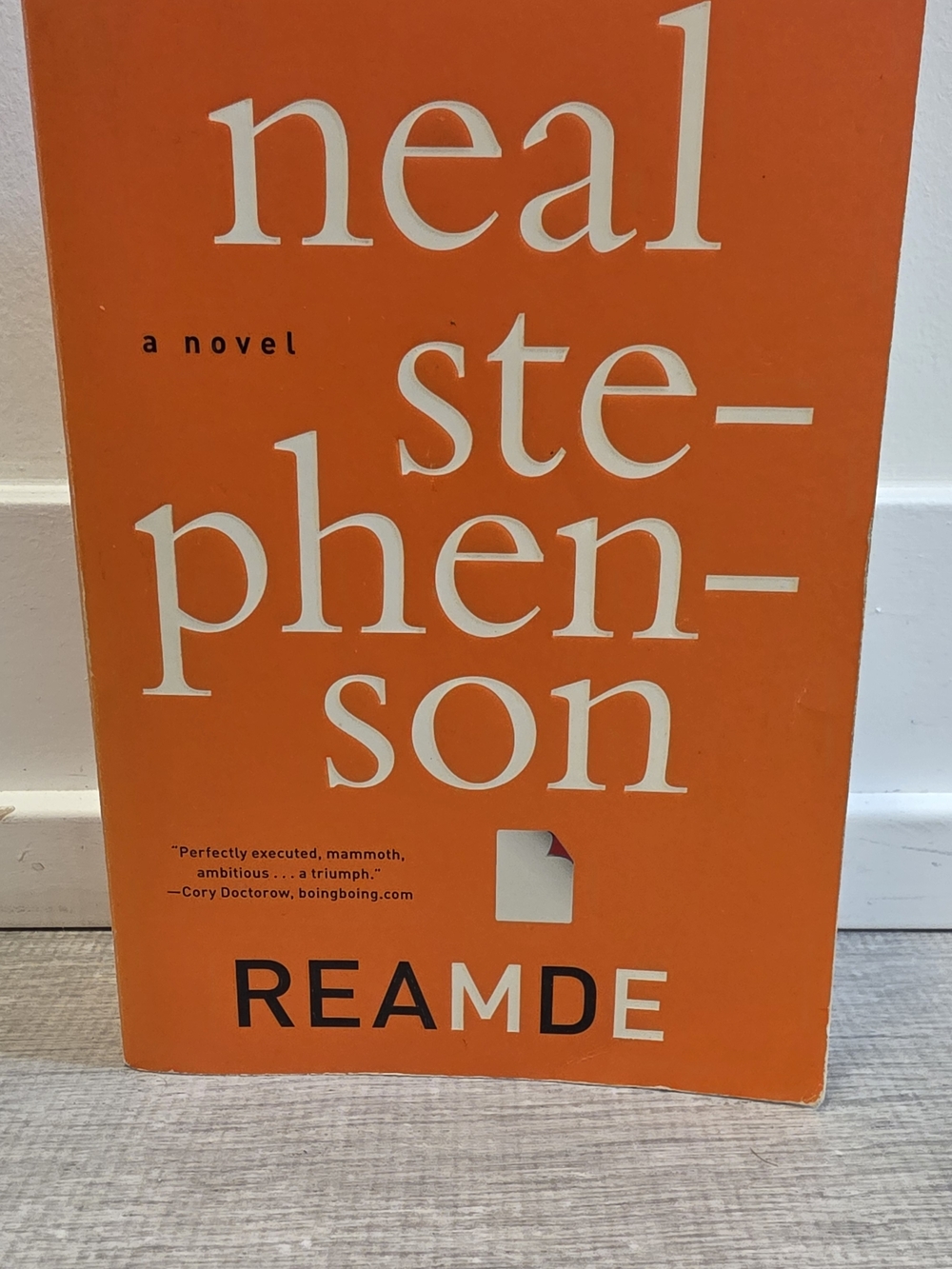 Neal Stephenson Reamde - Orange Paperback Novel